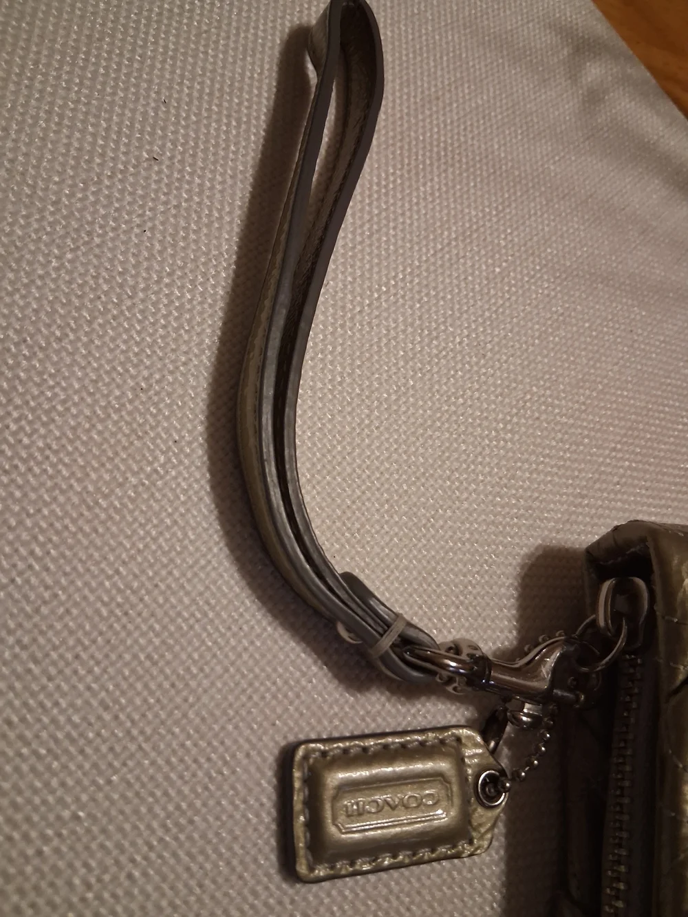Coach Metallic Gold Leather Embossed C Pattern Wristlet Clutch